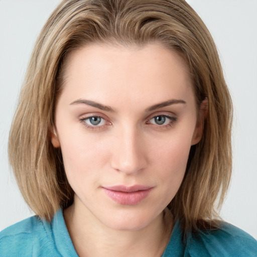 Neutral white young-adult female with medium  brown hair and blue eyes