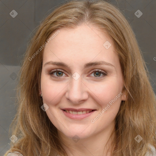 Joyful white young-adult female with long  brown hair and green eyes