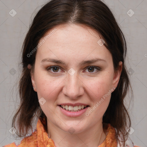 Joyful white young-adult female with medium  brown hair and brown eyes