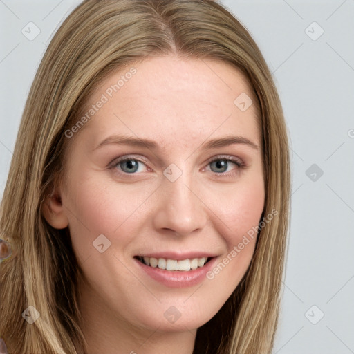 Joyful white young-adult female with long  brown hair and blue eyes