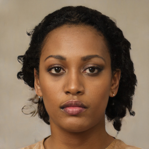Neutral black young-adult female with medium  black hair and brown eyes