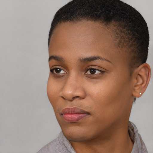 Neutral black young-adult female with short  brown hair and brown eyes