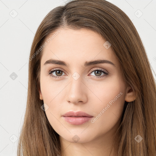 Neutral white young-adult female with long  brown hair and brown eyes