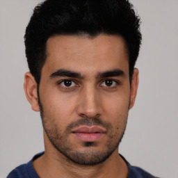 Neutral latino young-adult male with short  black hair and brown eyes