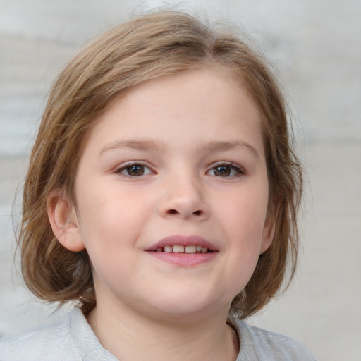 Joyful white child female with medium  brown hair and blue eyes