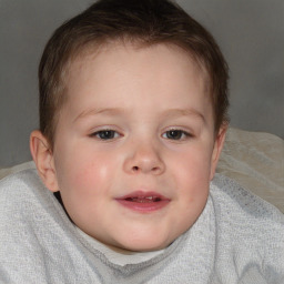 Joyful white child female with short  brown hair and blue eyes