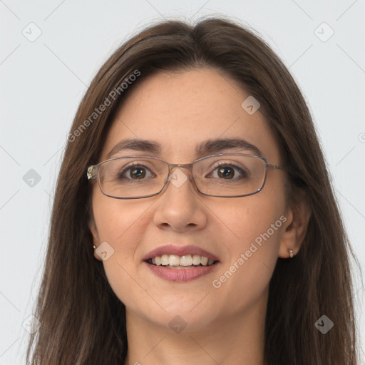 Joyful white young-adult female with long  brown hair and grey eyes