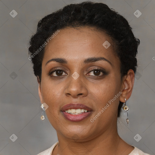 Joyful black young-adult female with short  brown hair and brown eyes