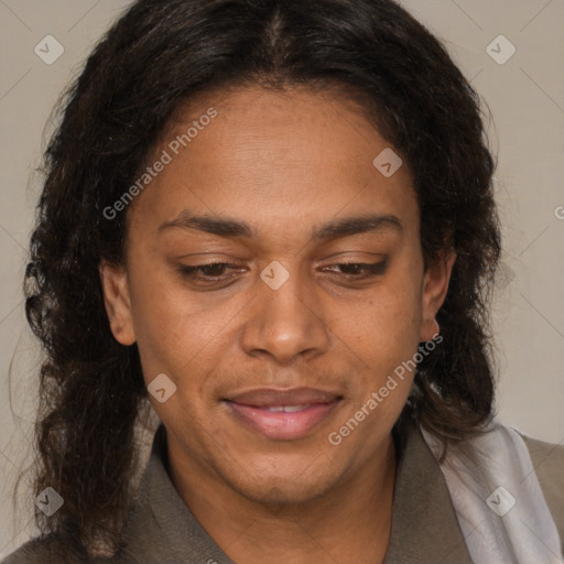 Joyful black adult female with medium  brown hair and brown eyes