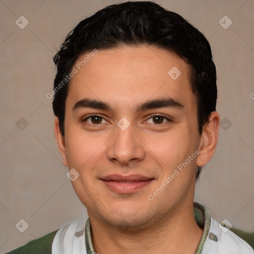 Joyful white young-adult male with short  black hair and brown eyes