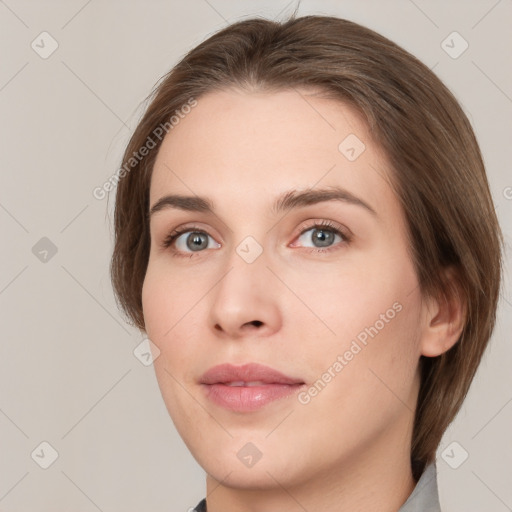 Neutral white young-adult female with medium  brown hair and grey eyes