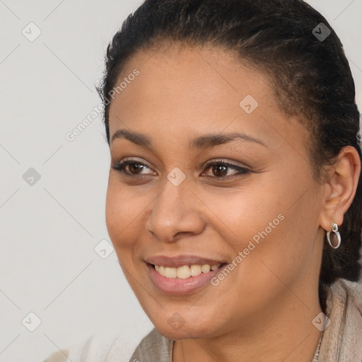 Joyful latino young-adult female with short  brown hair and brown eyes