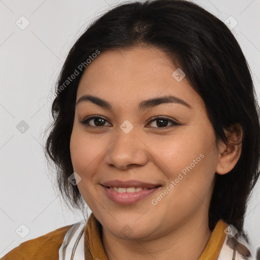 Joyful latino young-adult female with medium  brown hair and brown eyes