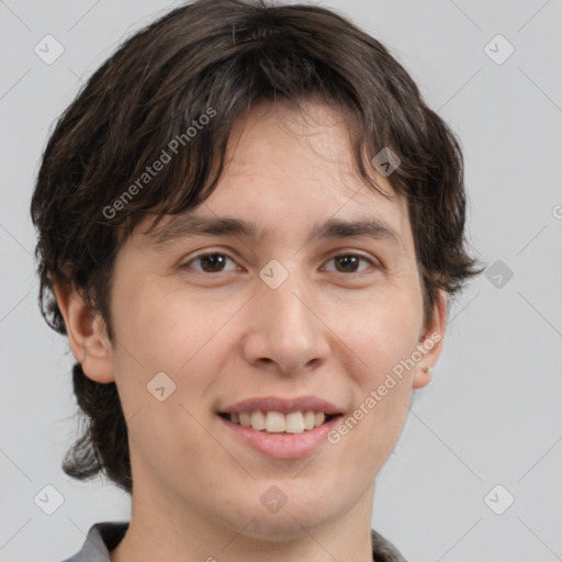 Joyful white young-adult male with medium  brown hair and brown eyes