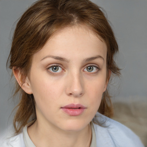 Neutral white young-adult female with medium  brown hair and blue eyes