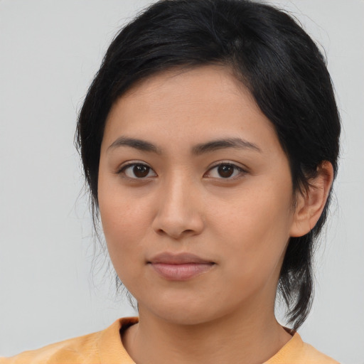 Neutral asian young-adult female with medium  black hair and brown eyes