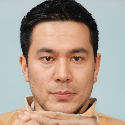 Neutral asian young-adult male with short  brown hair and brown eyes