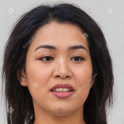 Joyful asian young-adult female with long  brown hair and brown eyes