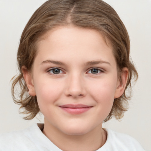 Joyful white child female with medium  brown hair and grey eyes