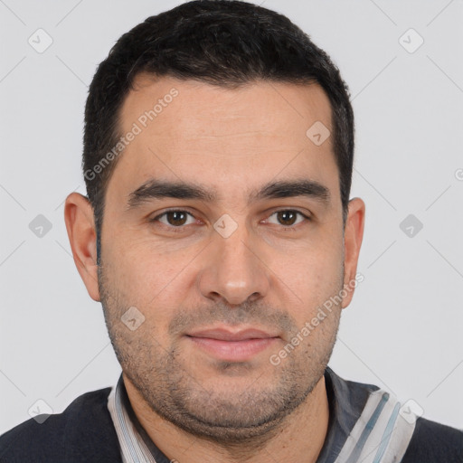 Joyful white young-adult male with short  black hair and brown eyes