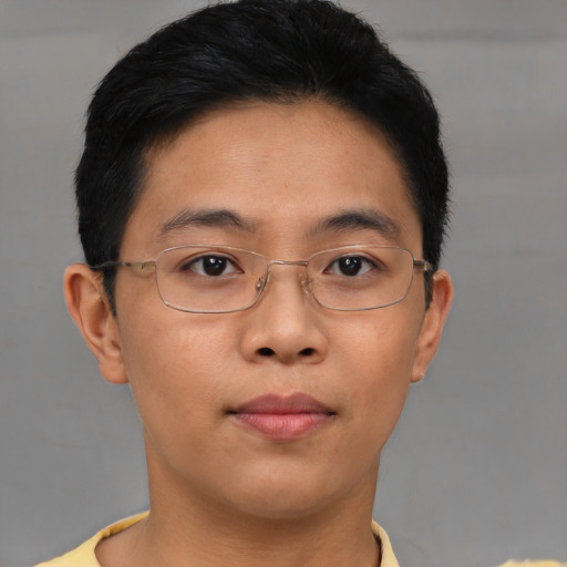Neutral asian young-adult male with short  brown hair and brown eyes