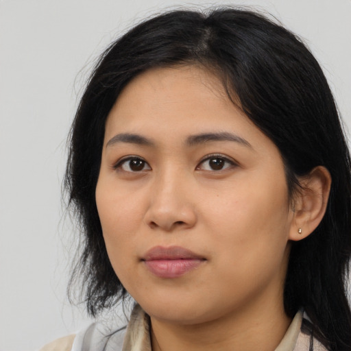 Neutral asian young-adult female with medium  black hair and brown eyes