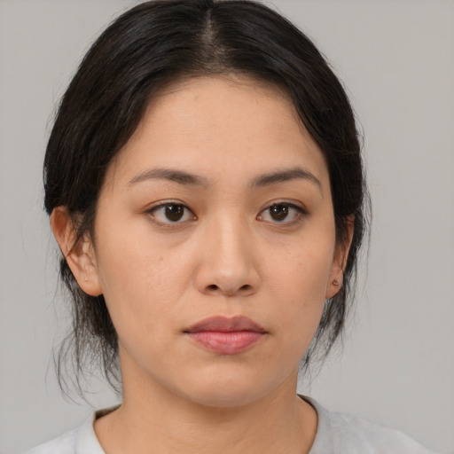 Neutral asian young-adult female with medium  brown hair and brown eyes