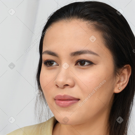 Joyful asian young-adult female with long  brown hair and brown eyes