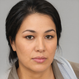 Neutral asian young-adult female with medium  brown hair and brown eyes