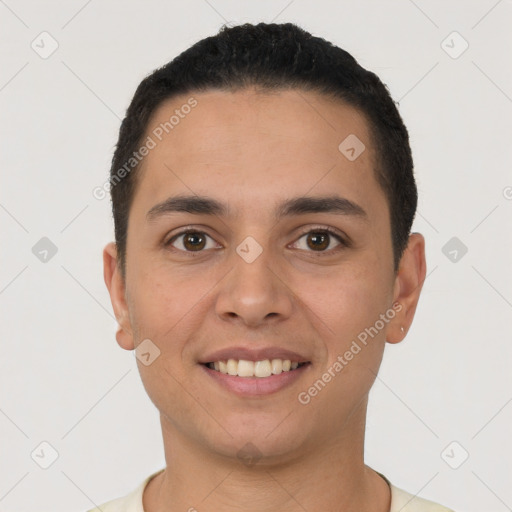 Joyful white young-adult male with short  black hair and brown eyes