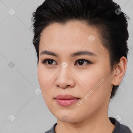 Joyful asian young-adult female with medium  black hair and brown eyes