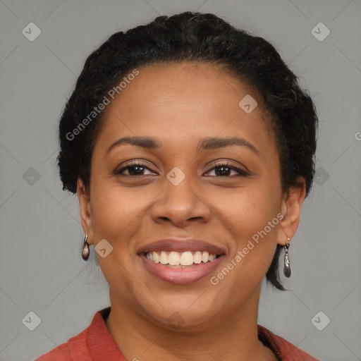 Joyful black young-adult female with medium  black hair and brown eyes