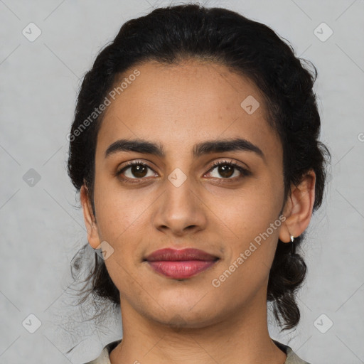 Joyful latino young-adult female with medium  black hair and brown eyes