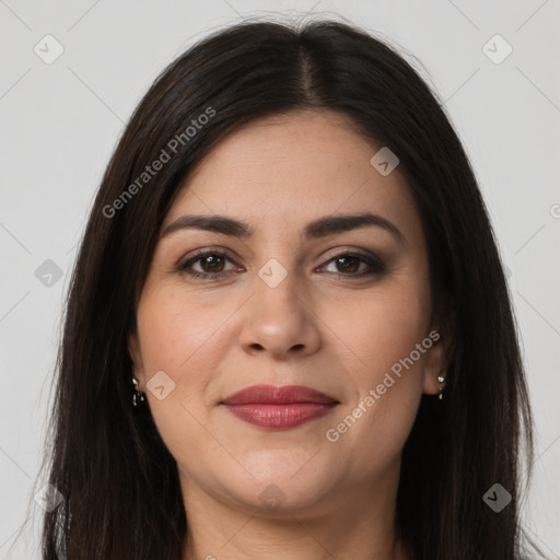 Joyful white young-adult female with long  brown hair and brown eyes