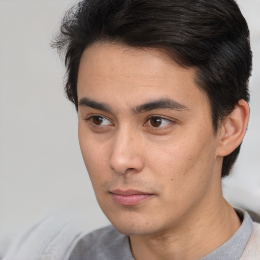 Neutral white young-adult male with short  black hair and brown eyes