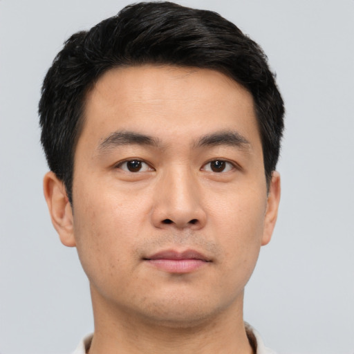 Neutral asian young-adult male with short  black hair and brown eyes