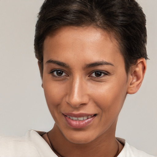 Joyful white young-adult female with short  brown hair and brown eyes