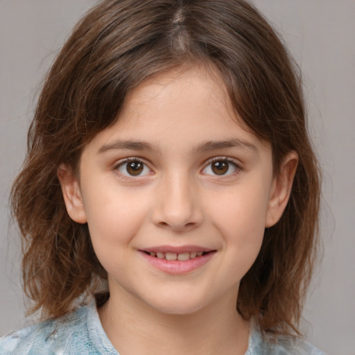 Joyful white child female with medium  brown hair and brown eyes