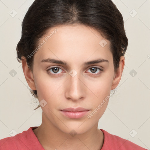 Neutral white young-adult female with short  brown hair and brown eyes