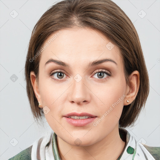 Joyful white young-adult female with medium  brown hair and blue eyes