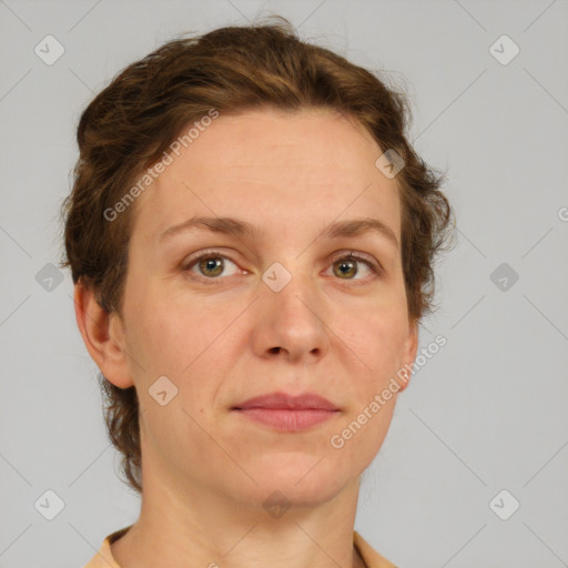 Joyful white adult female with short  brown hair and grey eyes