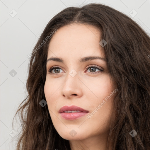 Neutral white young-adult female with long  brown hair and brown eyes