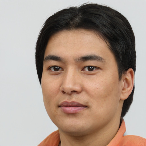 Neutral asian young-adult male with short  brown hair and brown eyes