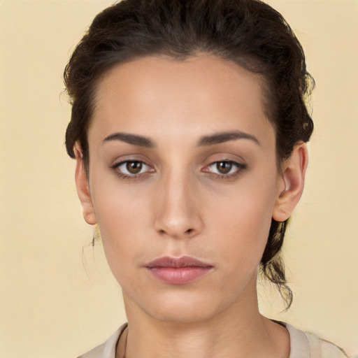 Neutral white young-adult female with long  brown hair and brown eyes