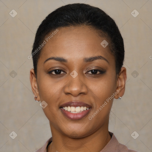 Joyful latino young-adult female with short  black hair and brown eyes