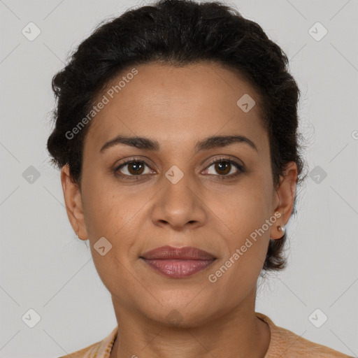 Joyful latino young-adult female with short  brown hair and brown eyes