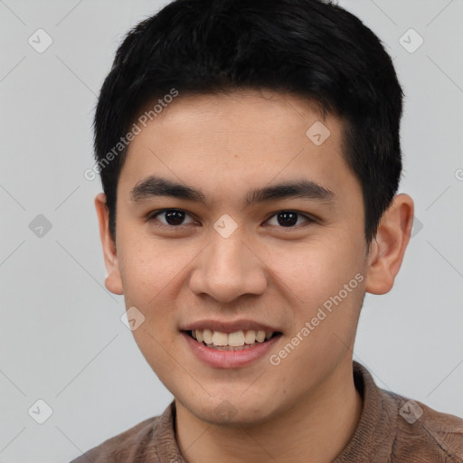 Joyful white young-adult male with short  black hair and brown eyes