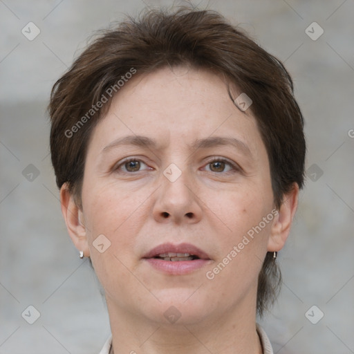 Joyful white adult female with short  brown hair and brown eyes