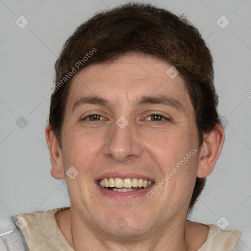 Joyful white adult male with short  brown hair and grey eyes