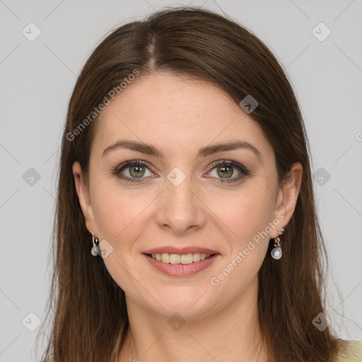 Joyful white young-adult female with long  brown hair and green eyes